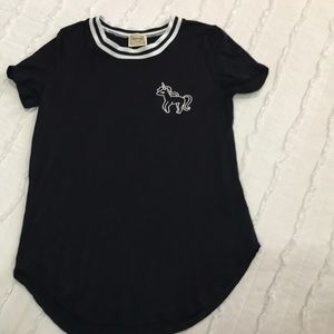 Black shirt with white and black collar